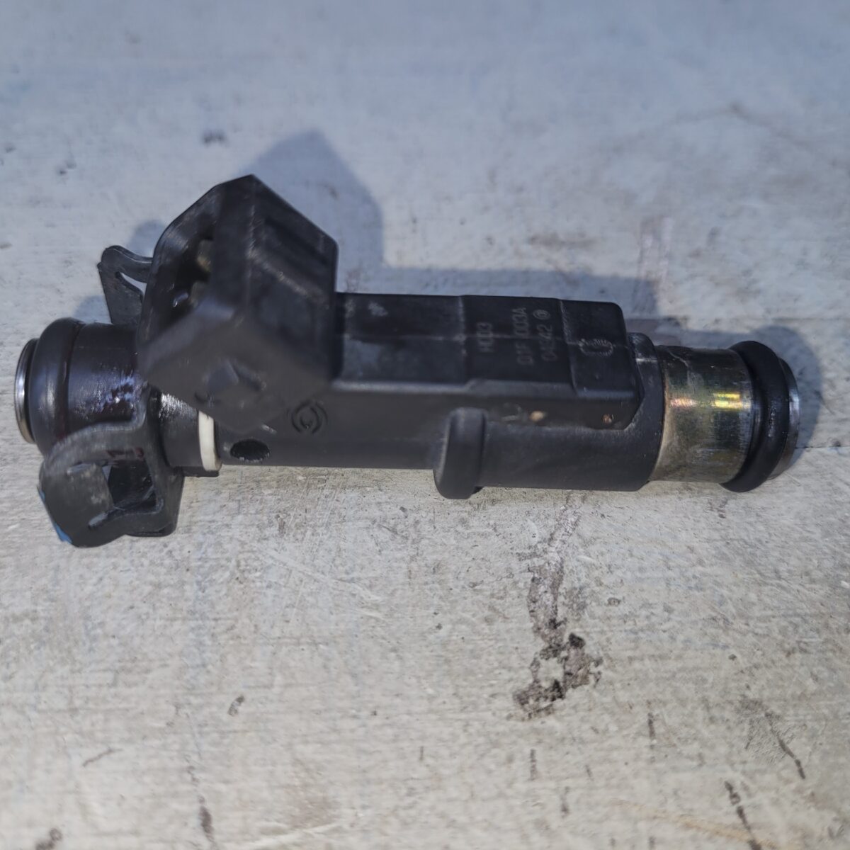 Fuel injector, a component that may need cleaning.