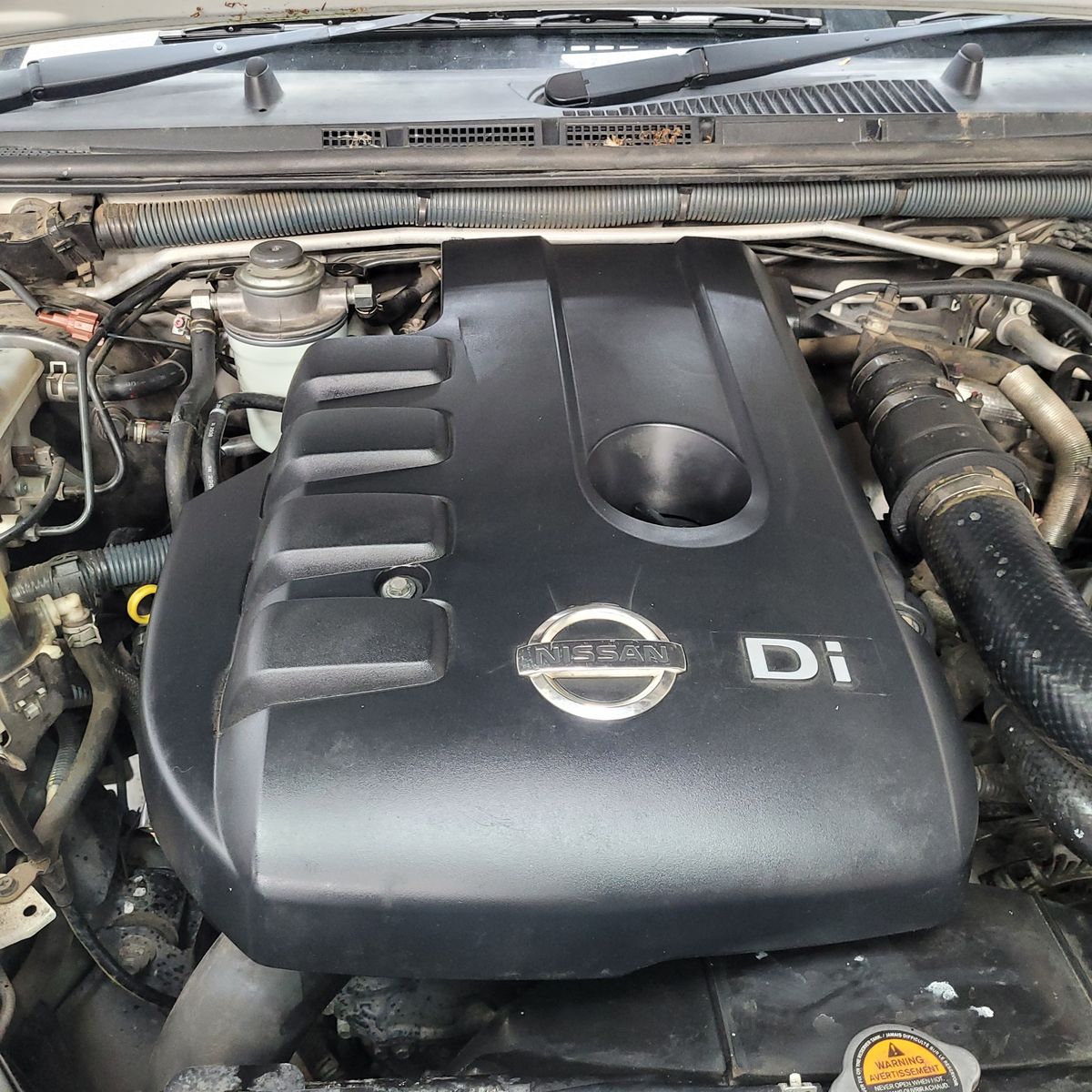 Nissan Diesel Engine Compartment Nissan diesel engine with Di badge under the hood