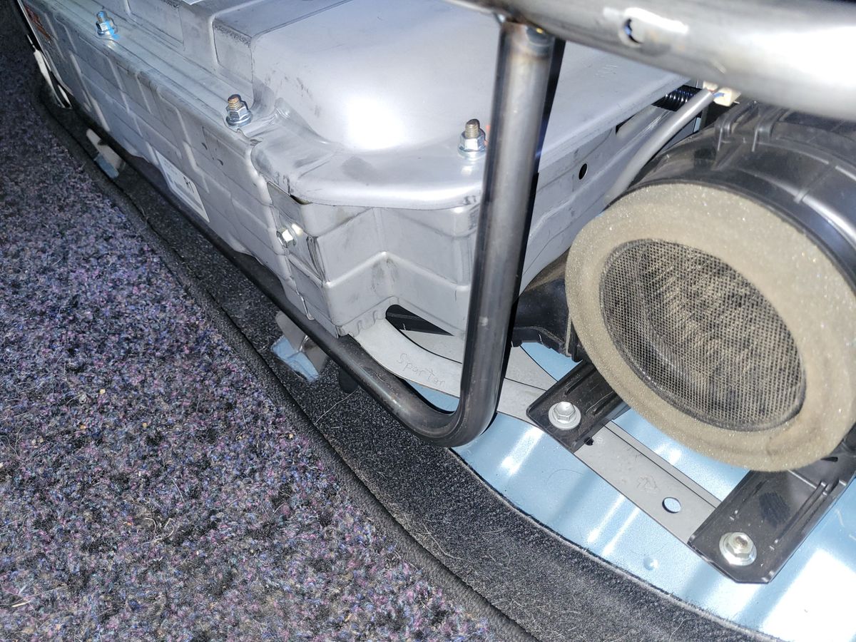 Hybrid car battery pack with protective casing and cooling vent visible